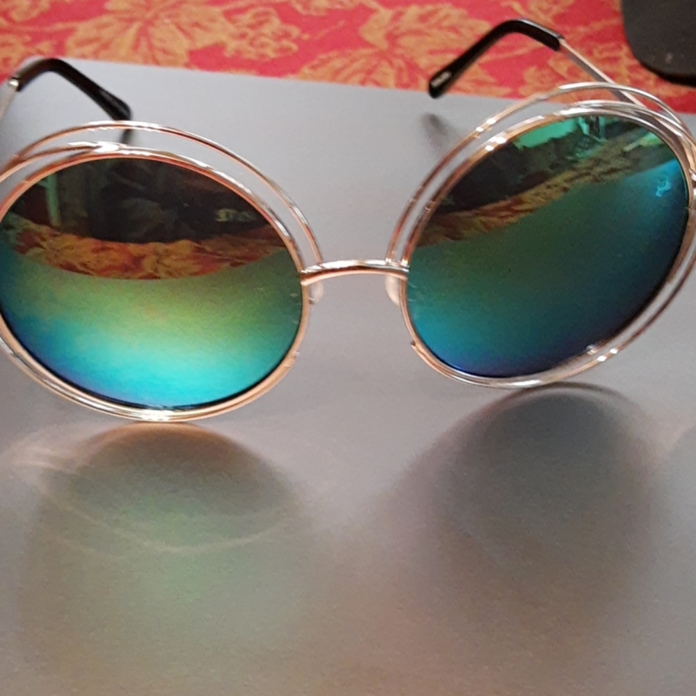 Large-lensed, slightly tinted sunglasses